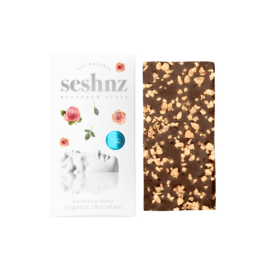 Seshnz organic sea salt almond chocolate bar with packaging on a white background