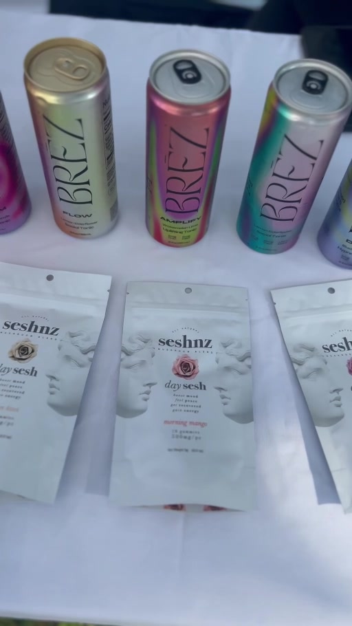 BRĒZ functional drinks and Seshnz mushroom gummy packs displayed together at FungiPopUp